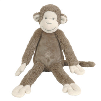 brown plush soft monkey on white background