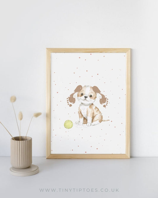 Framed artwork of a dog with footprint ears and a polka dot background on a white wall.