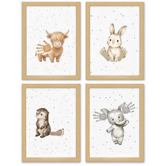 Set of four framed baby animal art prints featuring a Highland cow, bunny, otter, and elephant with handprints and footprints on a white background with tiny colorful speckles, in light wood frames.