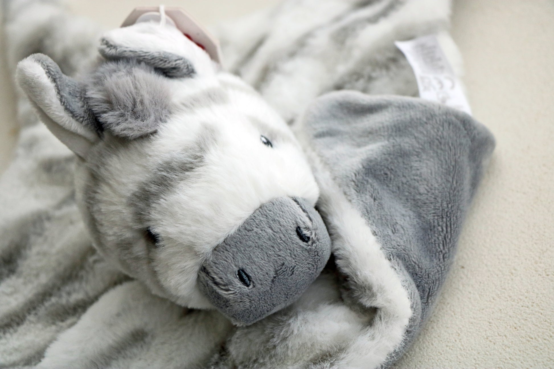 Keeleco Cuddle Zebra Blanket Comforter Baby Zebra Soft Toy Plush on white background close up