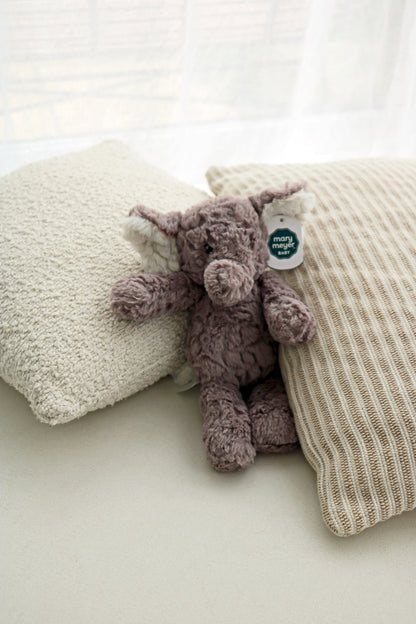 Mary Meyer Putty Elephant soft toy plush for babies and newborn on neutral cushions background