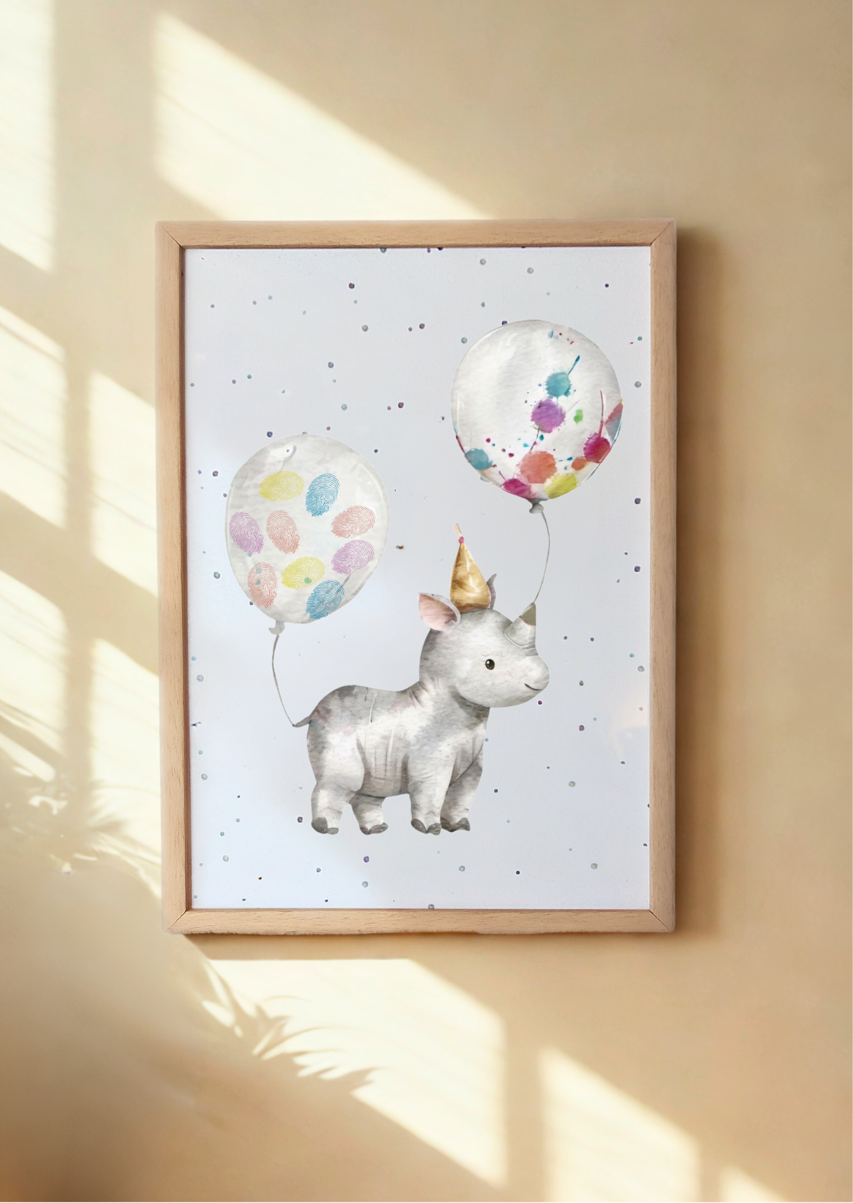 Framed artwork of a rhino with colorful fingerprints in the balloons on a light background
