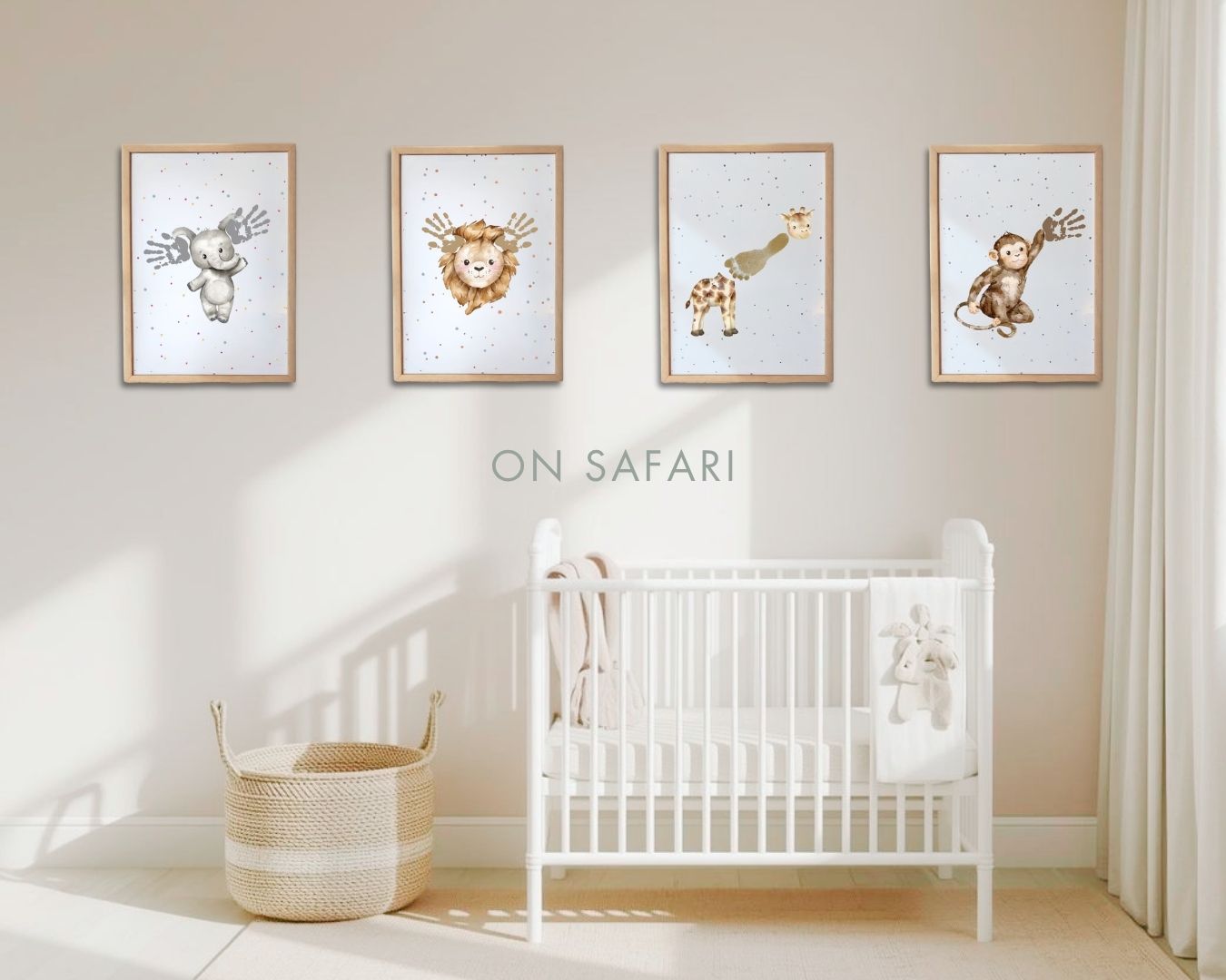 Nursery room with white crib and framed prints of handprint and footprint animals on a wall. safari theme elephant, lion, giraffe, monkey