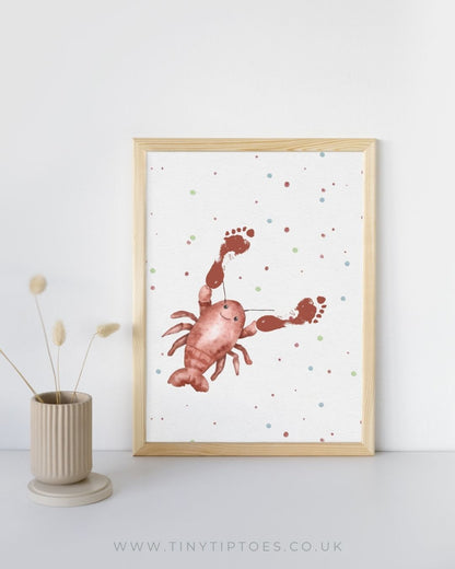 Framed illustration of a red yabby with footprint claws on a white background with colorful dots, next to a vase.