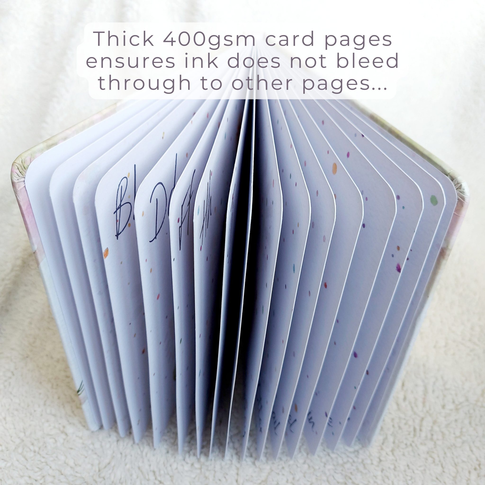 Little Paws Big Memories ABC Animals Baby hand and footprint Keepsake Book open showing thick 400gsm card pages. Text reads 'thick 400gsm card pages ensures ink does not bleed through to other pages'