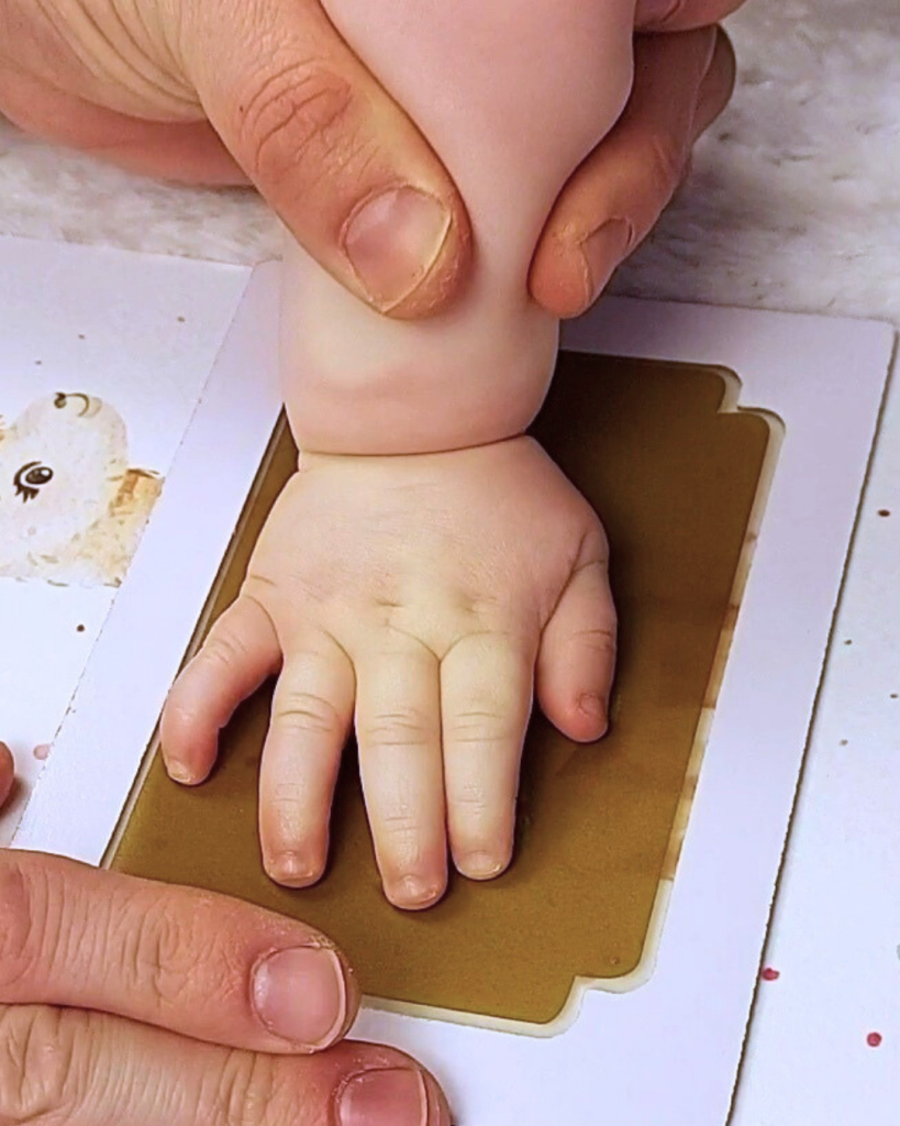 newborn baby handprint keepsake using clean touch mess free inkless ink pad