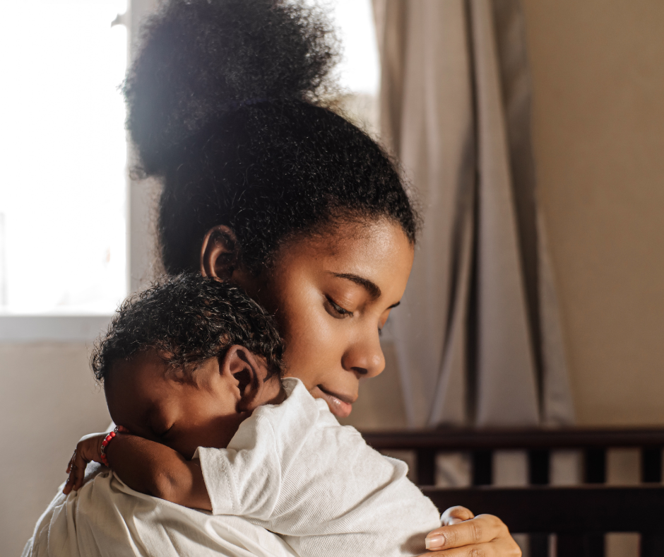 Mother cuddling newborn baby in nursery – quiet bonding moment and meaningful newborn memories